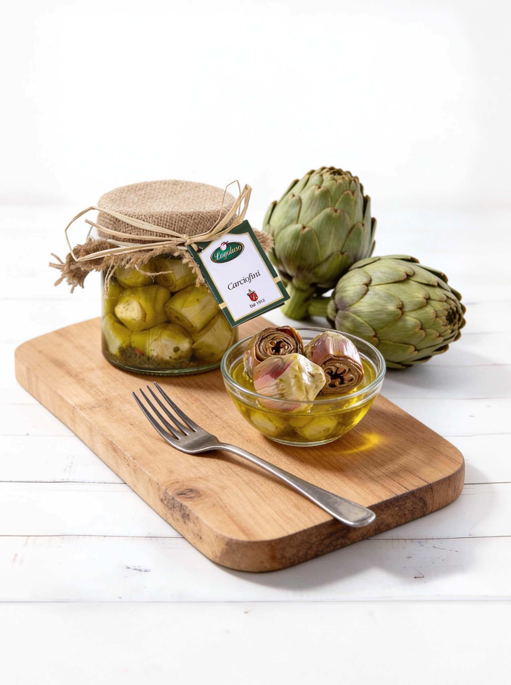 tagliere in legno con vasetto di carciofini in olio extravergine online